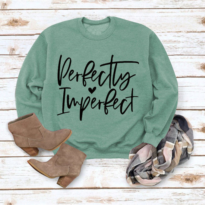 Light green sweater (black font) / S