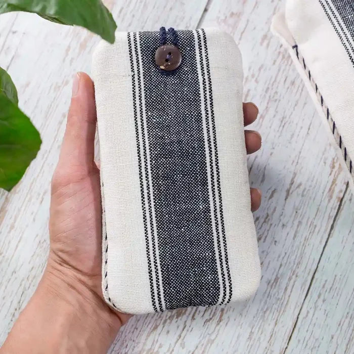 Vindigo phone case held in hand showing front stripe pattern