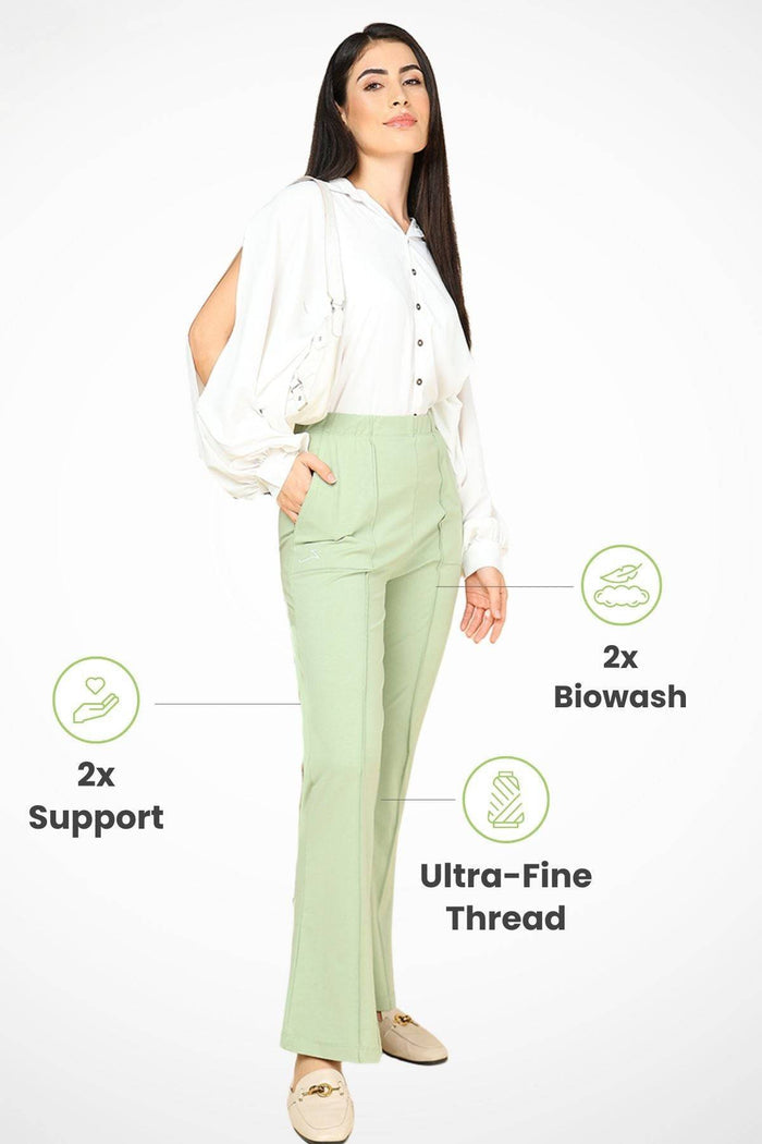 Model wearing Pistachio Maternity Pants; over-the-belly panel offers coverage and support.