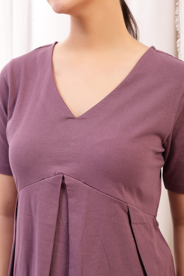 New mom wearing rosewood Maternity Tops; shows flattering post-delivery fit and Long Zip.