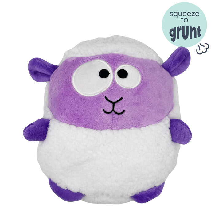 Dog with Pudgies Lady Baba Dog Toy on a white background.