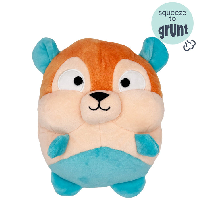 Dog with Pudgies Nutty Buddy Dog Toy on a white background.