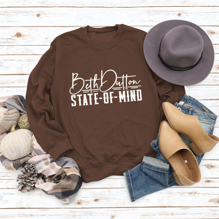 Brown sweater (white font) / S