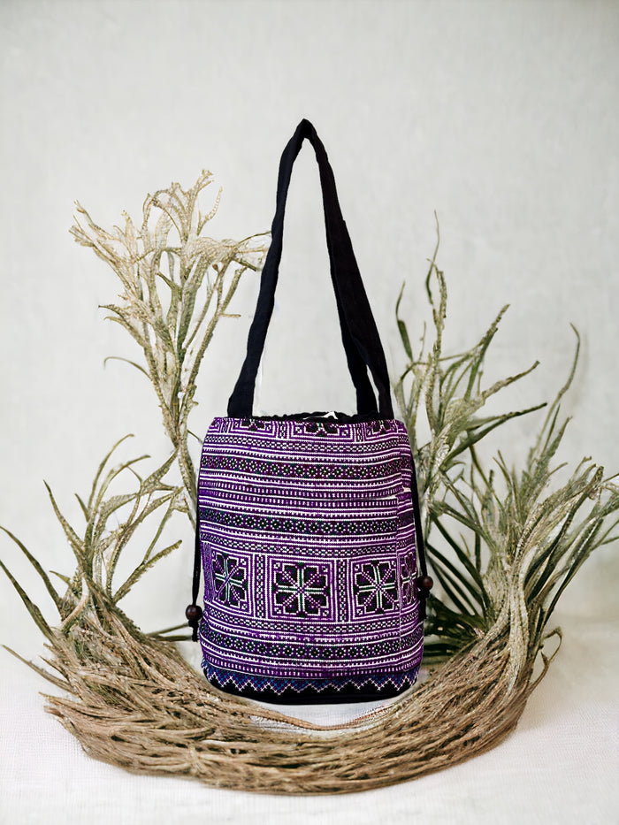 Purple embroidery shoulder bag with string to close