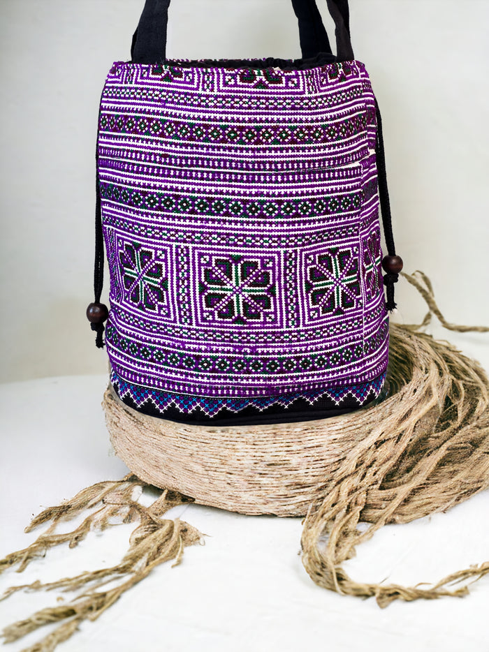 Purple embroidery shoulder bag with string to close