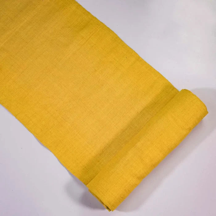 Vindigo yellow hemp fabric roll laid flat on white background