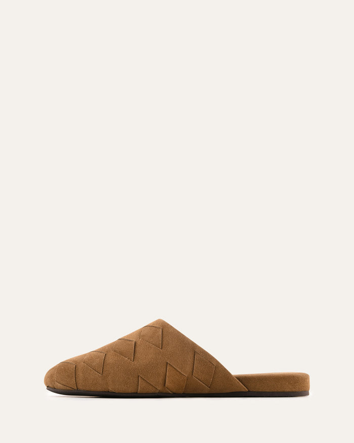 Brown slipper with geometric pattern on a white background