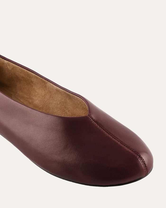 Brown leather shoe on a white background