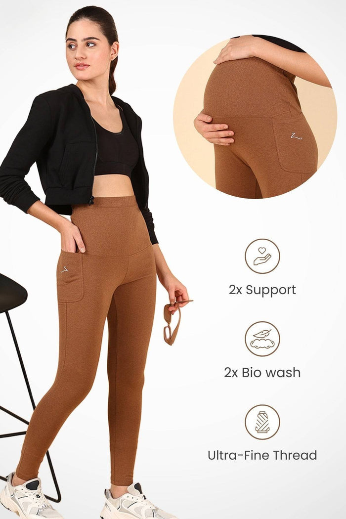 Model wearing Brown Ribbed Legging; wide ribbed panel stretches comfortably over the pregnant bump.