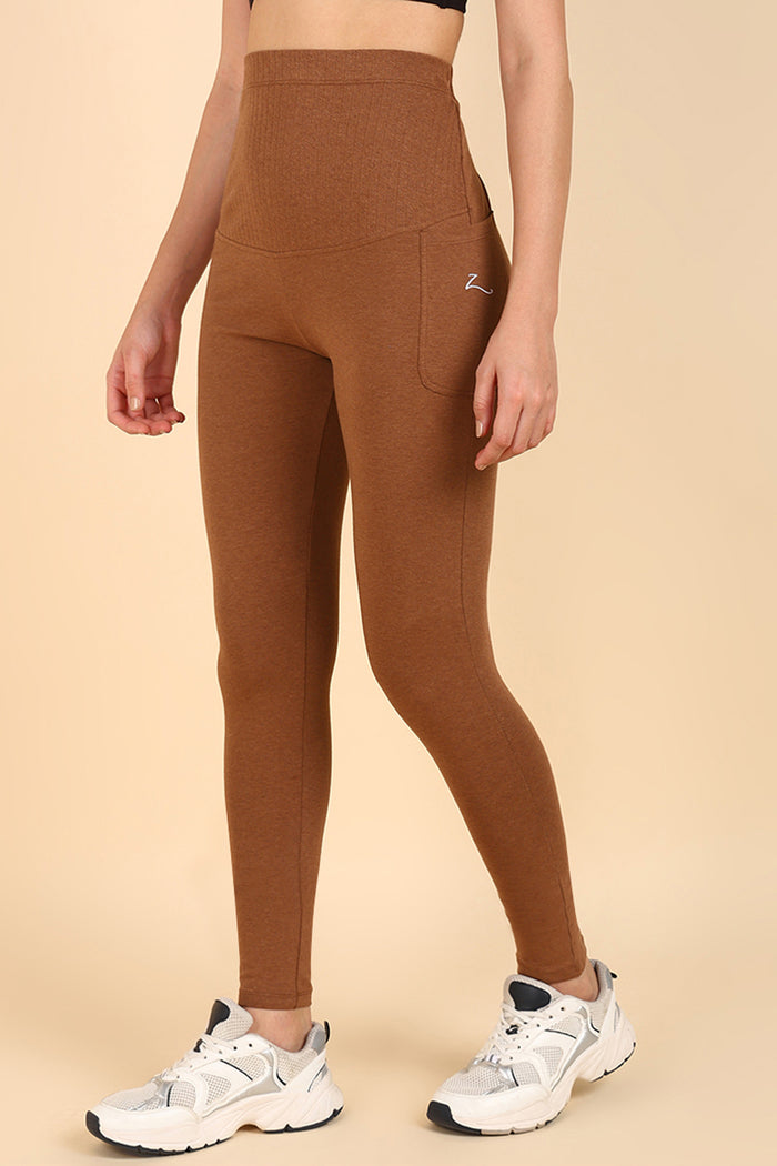 Brown Ribbed Legging for prenatal movement; soft ribbed fabric supports low-impact exercise.
