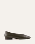 Green flat shoe on a white background