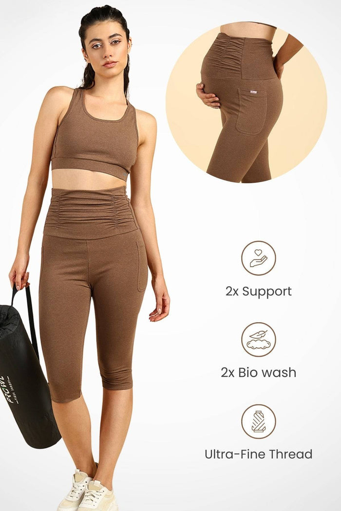Model wearing Brown Ruched Capri; mid-rise fit sits below the belly for support.