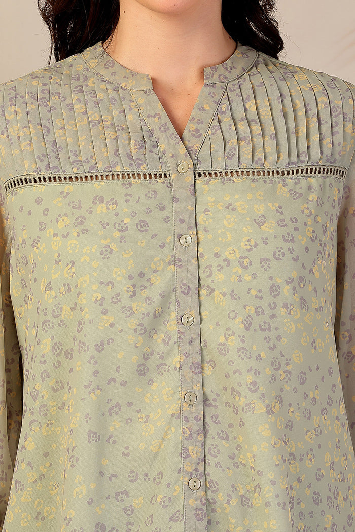 Sage Meadow Top hemline; straight hem allows easy layering.