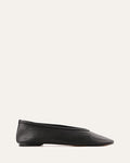 Black flat shoe on a white background