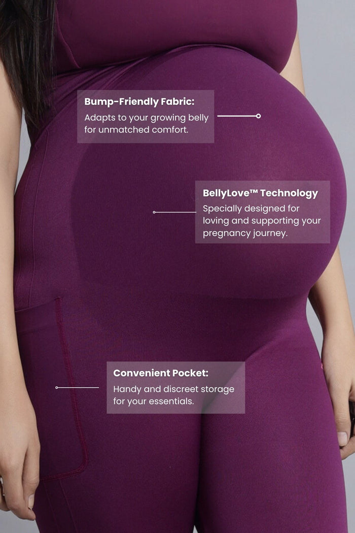 Model wearing Wine Leggings; seamless design ensures smooth look.