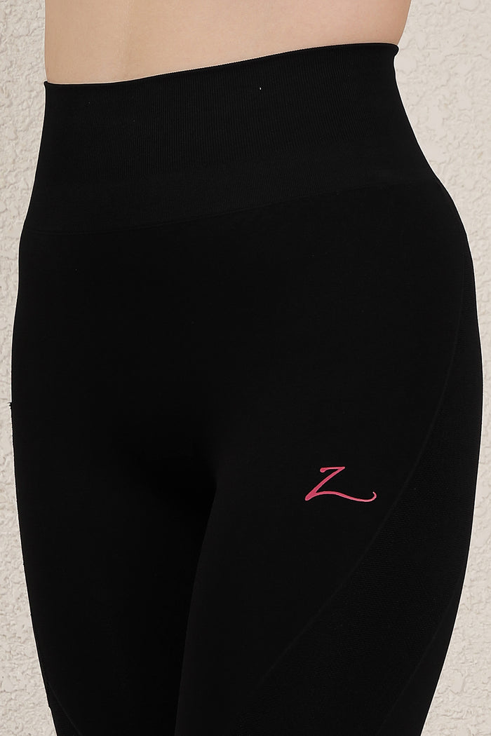 Black Legging ankle cuff; cuff provides secure fit around the ankle.