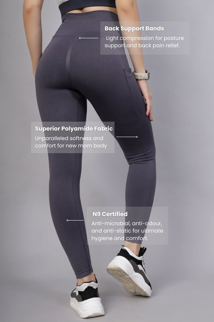 Model wearing Grey Seamless Leggings; fabric offers smooth compression fit.