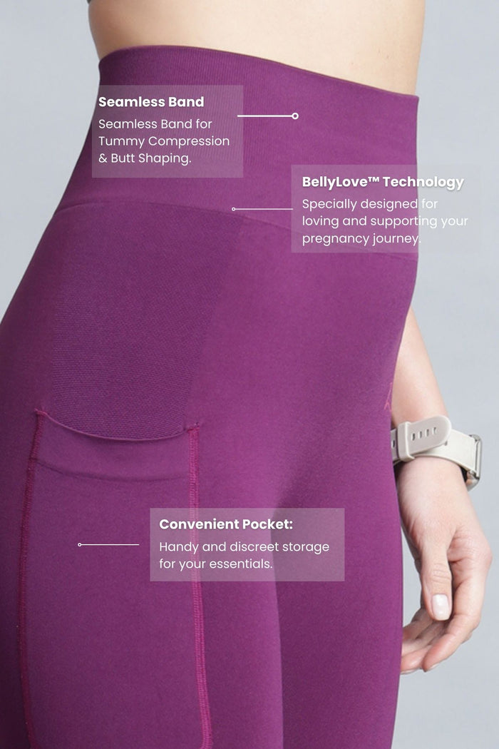 Model wearing Wine Seamless Leggings; fabric offers smooth compression fit.