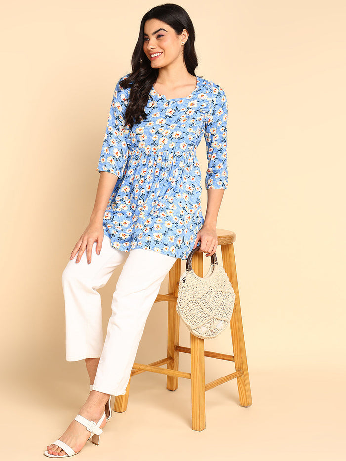 Aqua Blue Top with Pocket; pocket adds utility for modern mothers.