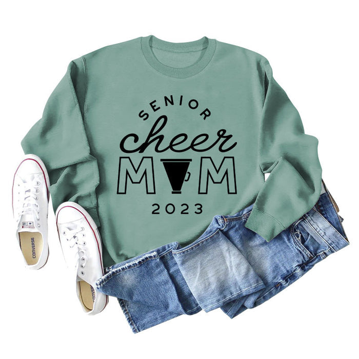 Light green sweater (black font) / S