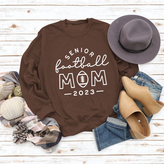 Coffee colored sweater (white font) / S