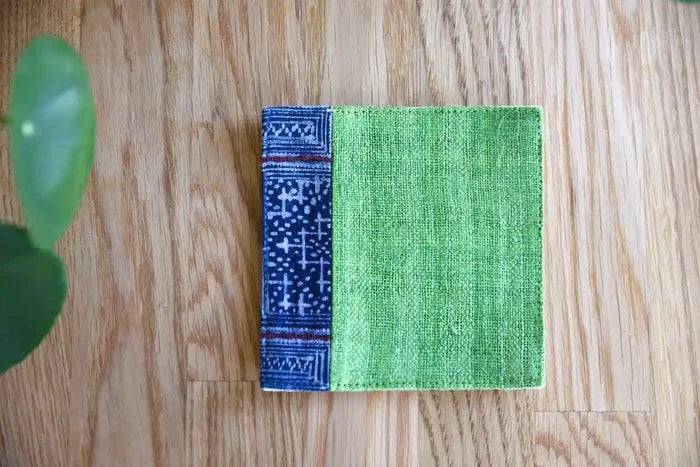 Fabric texture detail of green hemp coaster with indigo fabric