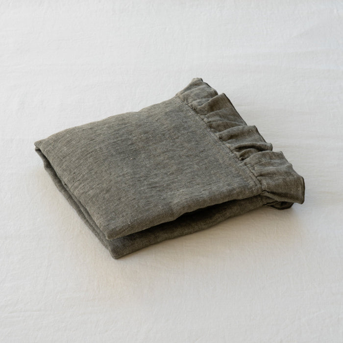 Folded gray fabric on a white background