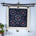 Vindigo indigo hemp batik tapestry hanging with green plant