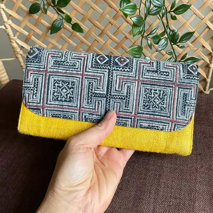 Vindigo long purse yellow hemp geo square front view with hand