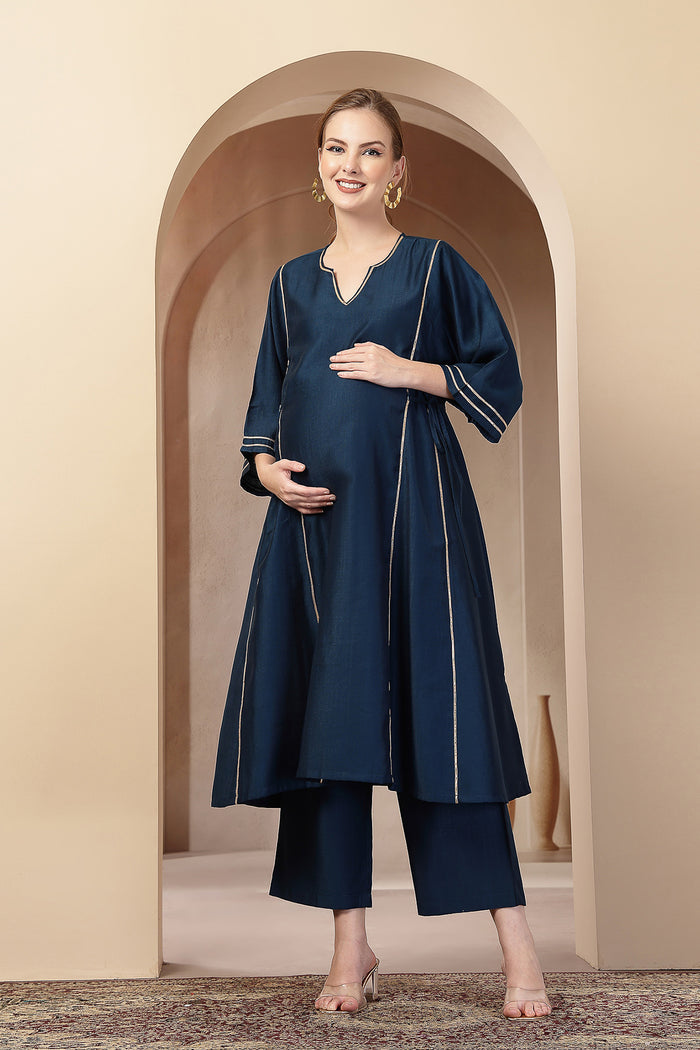 Side profile of the Teal Concealed Zip Suit Set, showing the smooth drape of the Roman Silk fabric.