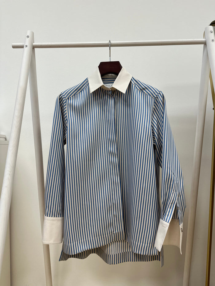 TENCEL™ Edit Blue Stripe Lounge Shirt hanging on a clothing rail.