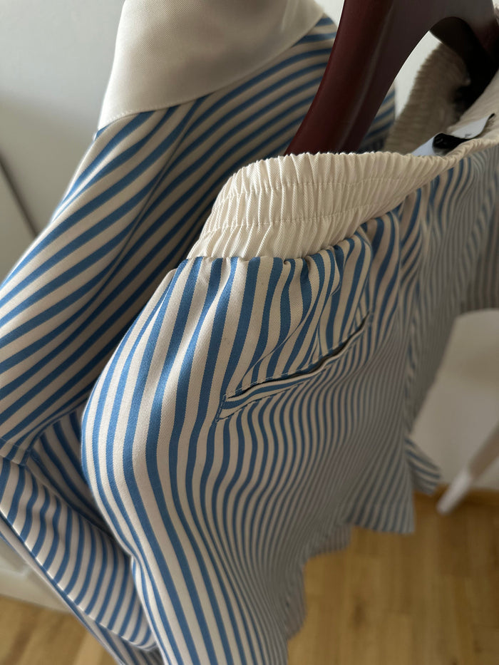 TENCEL™ Edit Blue Stripe Lounge Shorts worn, side pocket detail.