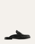 Black loafer shoe on a light gray background