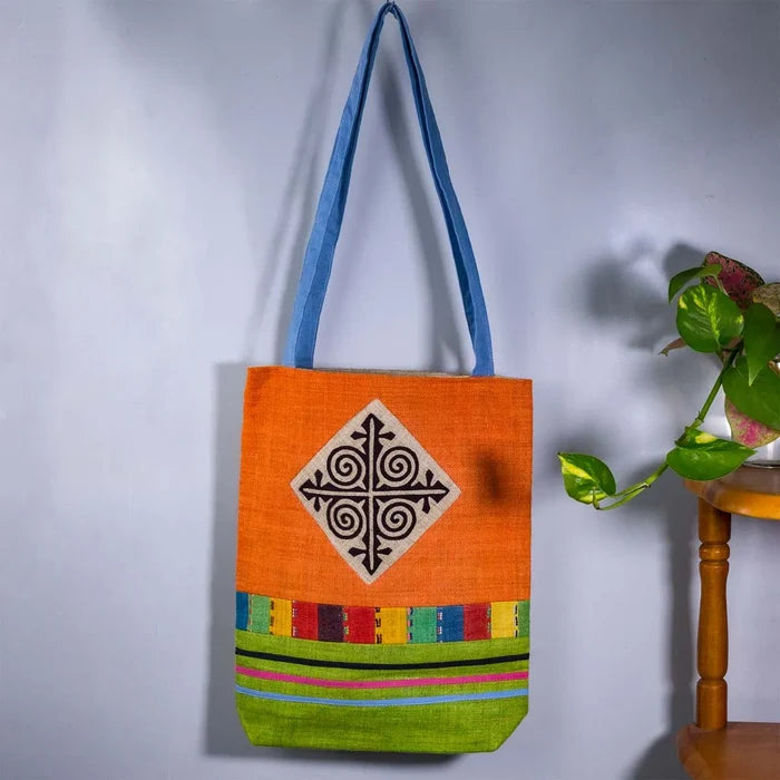 Vindigo shoulder bag orange hemp spiral patch full front hanging view