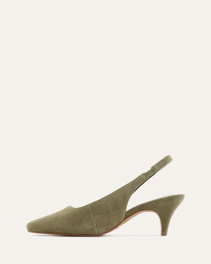 Green suede slingback shoe on a white background