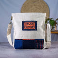Vindigo beige hemp crossbody bag with tribal embroidery patch front view