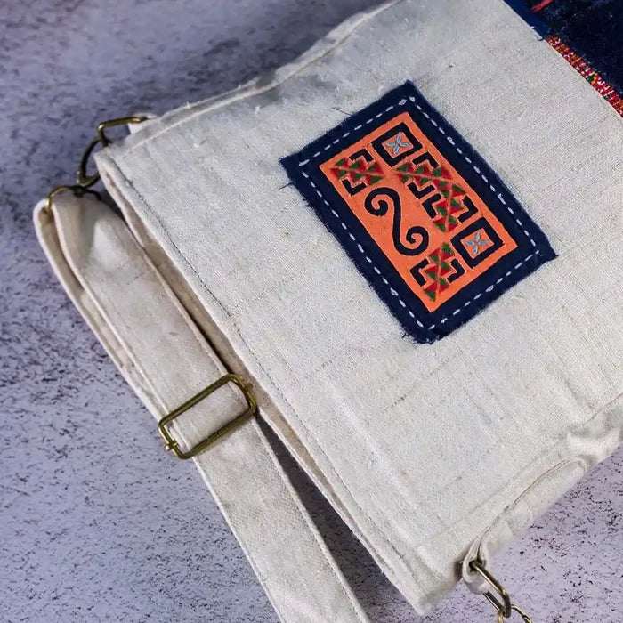 Vindigo handmade hemp bag close-up of orange tribal patch and stitching