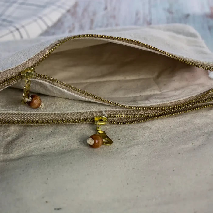 Vindigo hemp crossbody bag interior view with two zipper pockets