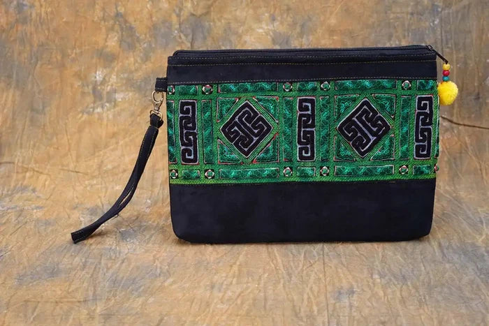 Vindigo hemp tribal clutch bag styled on natural wood background