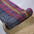 Vintage indigo rolls with pink and red stripes, block print patterns