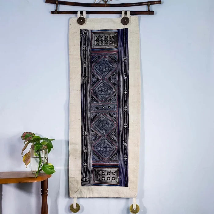 Vindigo indigo hemp batik tapestry displayed with plants