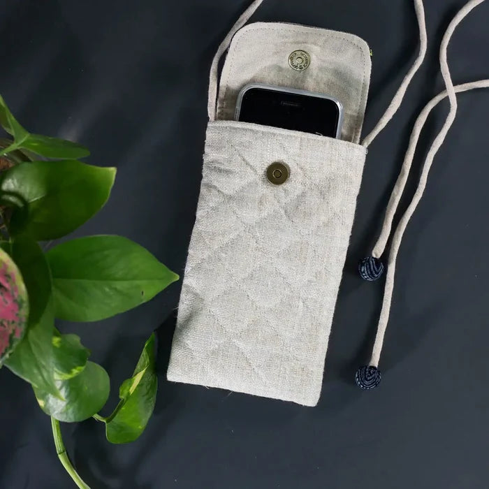 Handcrafted hemp phone bag with button closure and natural rope strap