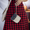 Close-up of white hemp mobilväska with authentic H’mong patch, versatile flip phone belt bag