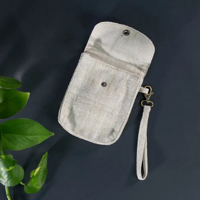 Back view of mobilväska in natural white hemp with strap, sustainable design for daily essentials.