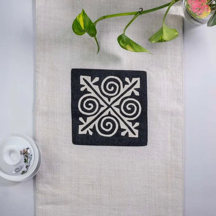 Vindigo beige hemp table runner close-up showing detailed geometric H’mong stitching