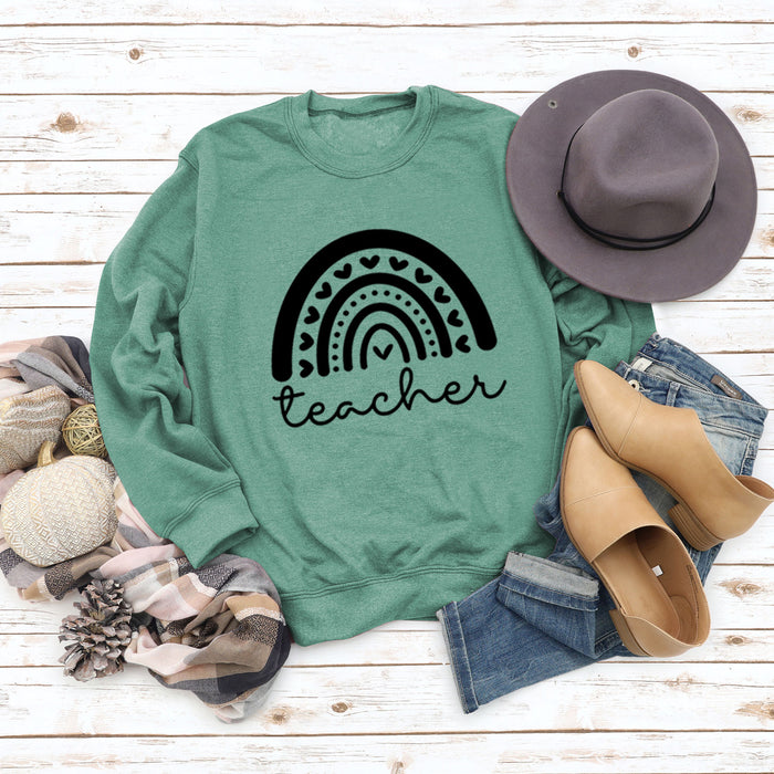 Light green sweater (black font) / S