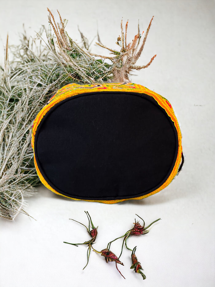 Yellow and blue embroidery shoulder bag with string to close