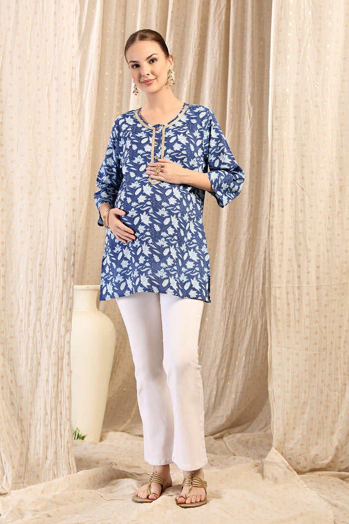 Indigo Embroidered Neck; embroidery adds style to the maternity top.
